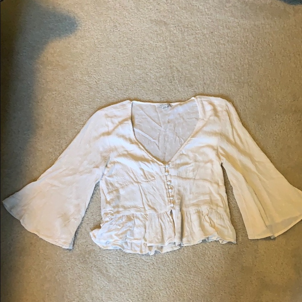 Cream flowy/bell sleeve American Eagle crop top